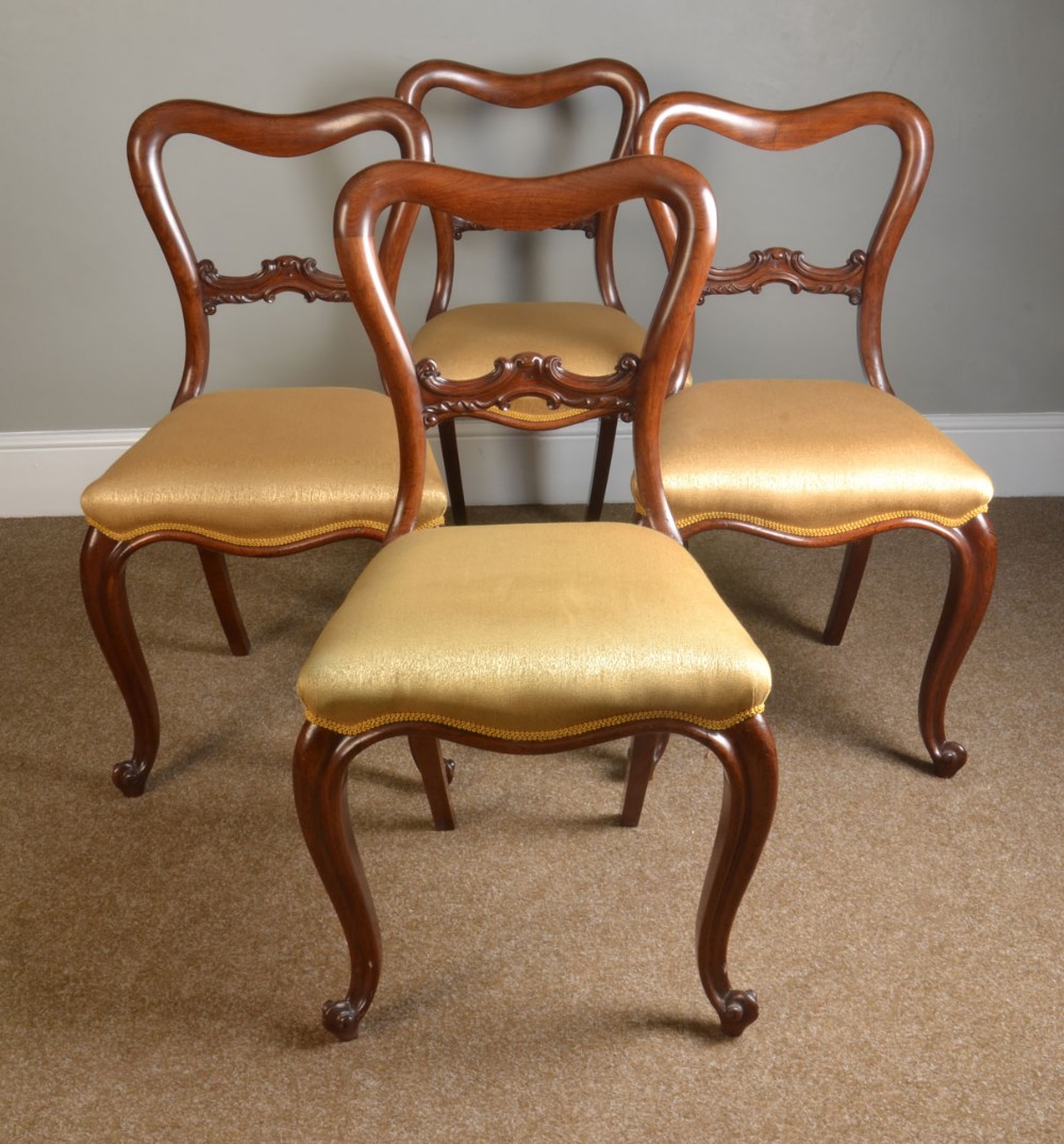 set of four dining chairs 