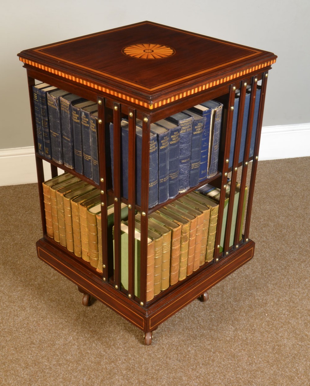 Edwardian mahogany inlaid revolving bookcase 