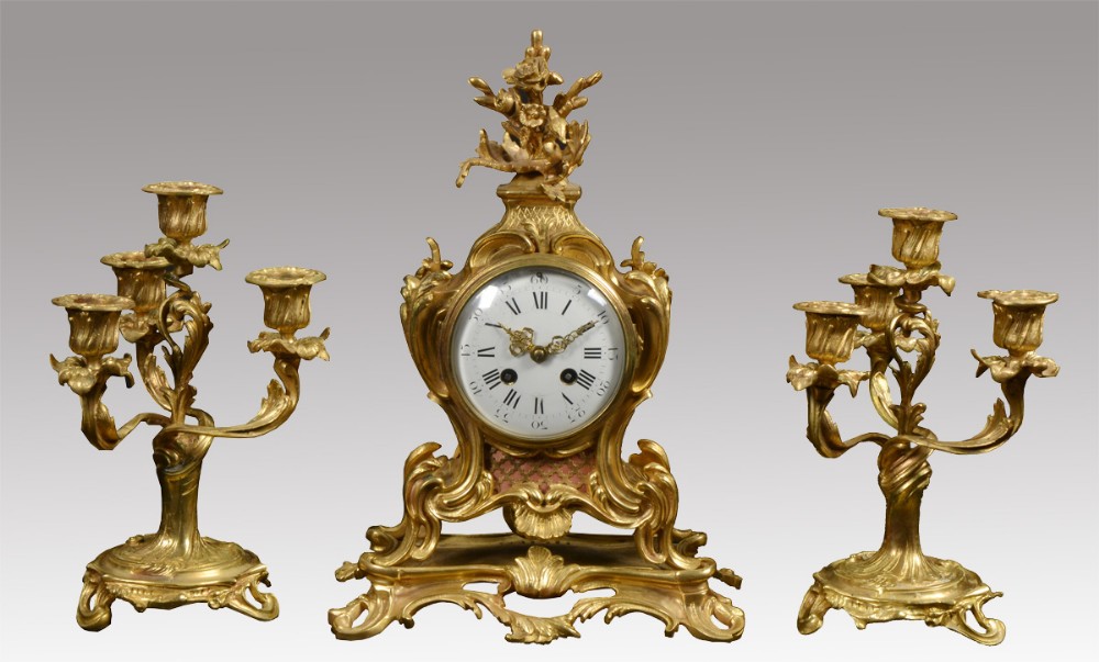 French three piece gilt metal mantle clock set 