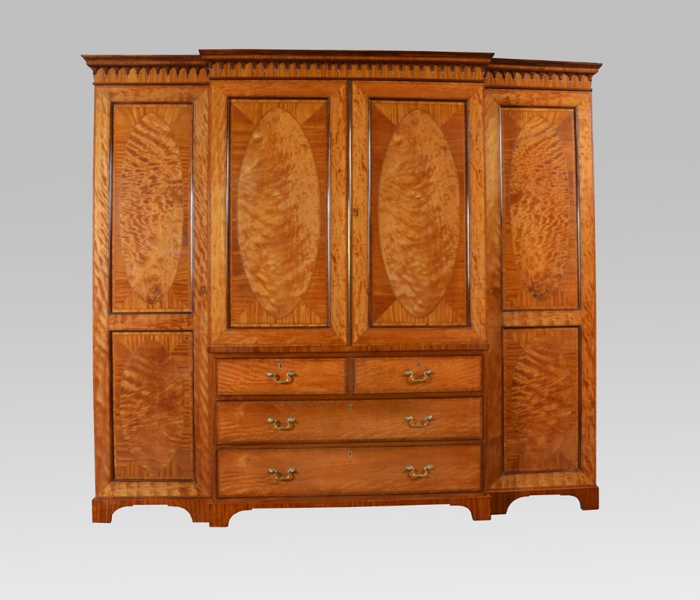 George III Satinwood four door breakfront wardrobe 