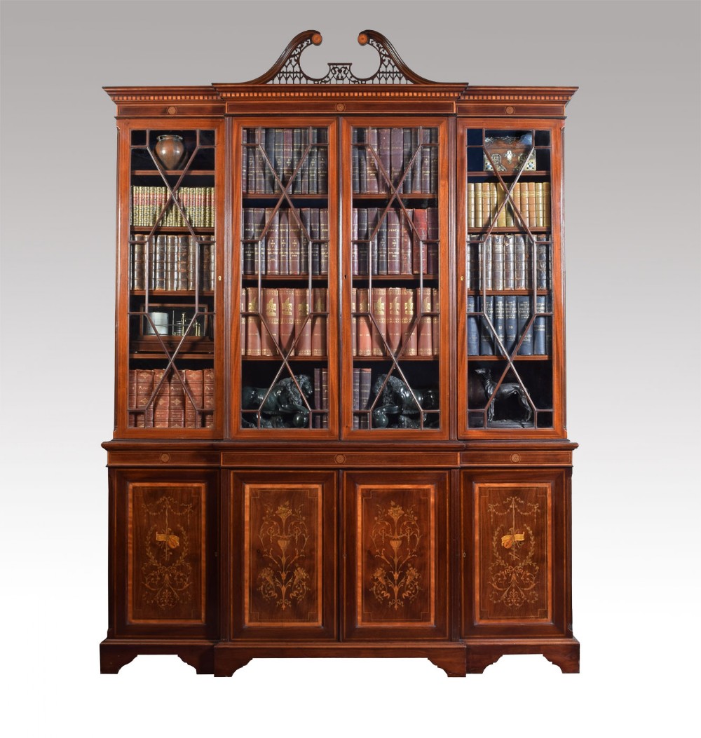large antique four door mahogany and marquetry inlaid breakfront bookcase cupboard by Edwards and Roberts