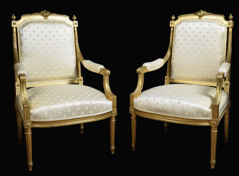 Pair of French Louis XVI style giltwood Armchairs
