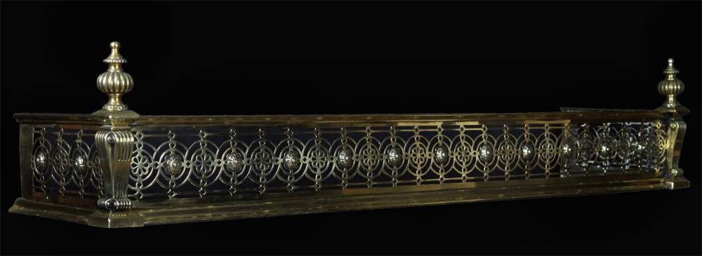 Edwardian brass pierced fender