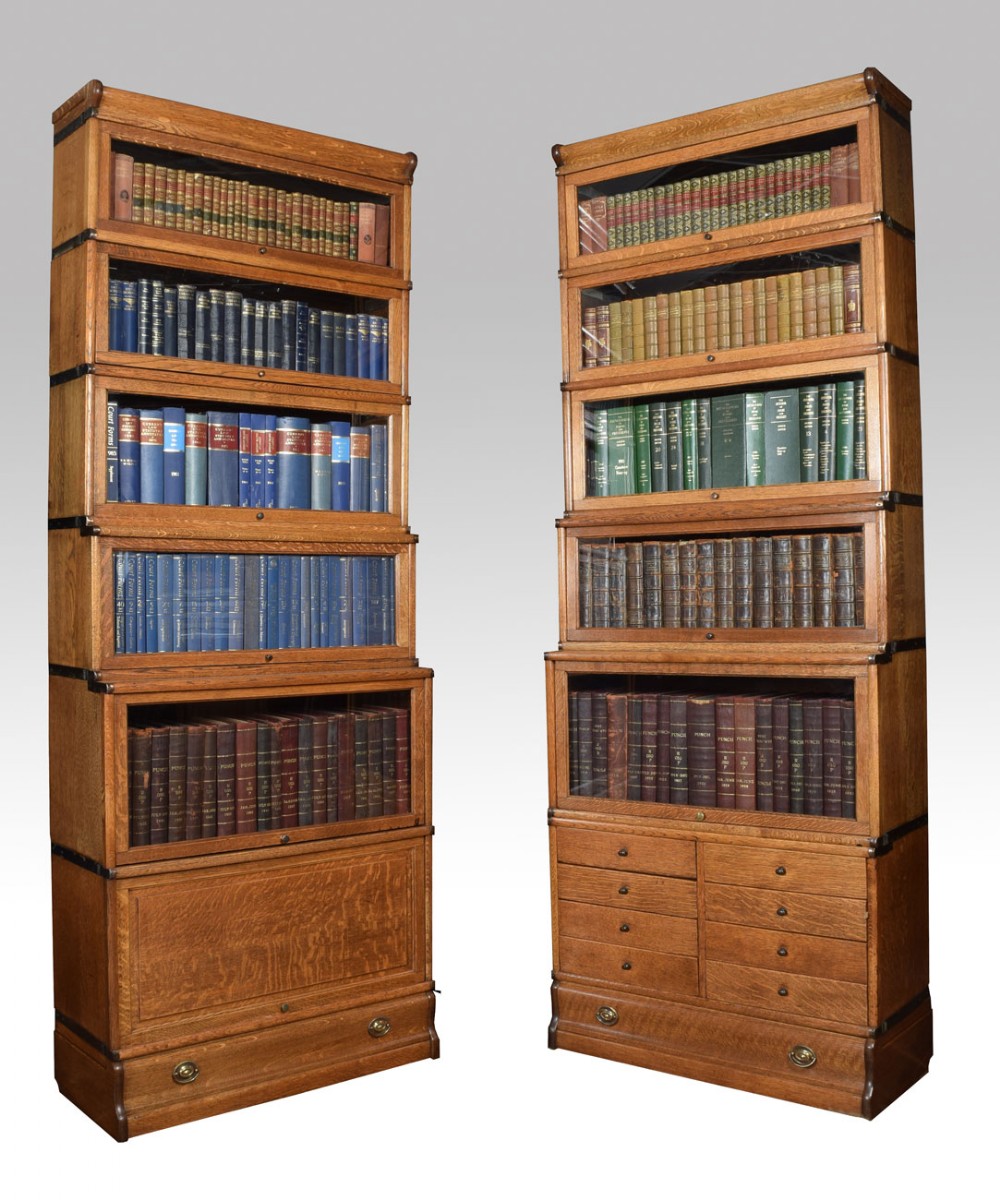 Two oak globe Wernicke six section bookcases
