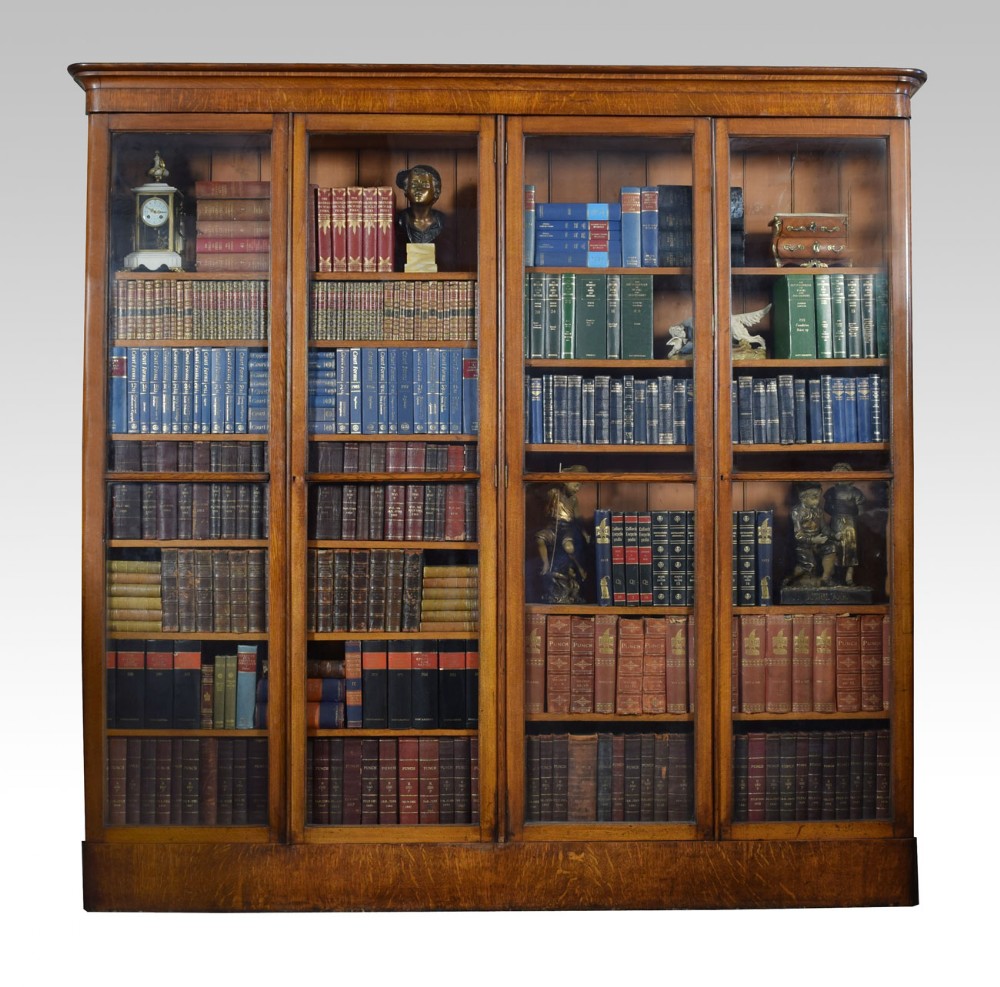 Large Victorian oak four door glazed library bookcase 