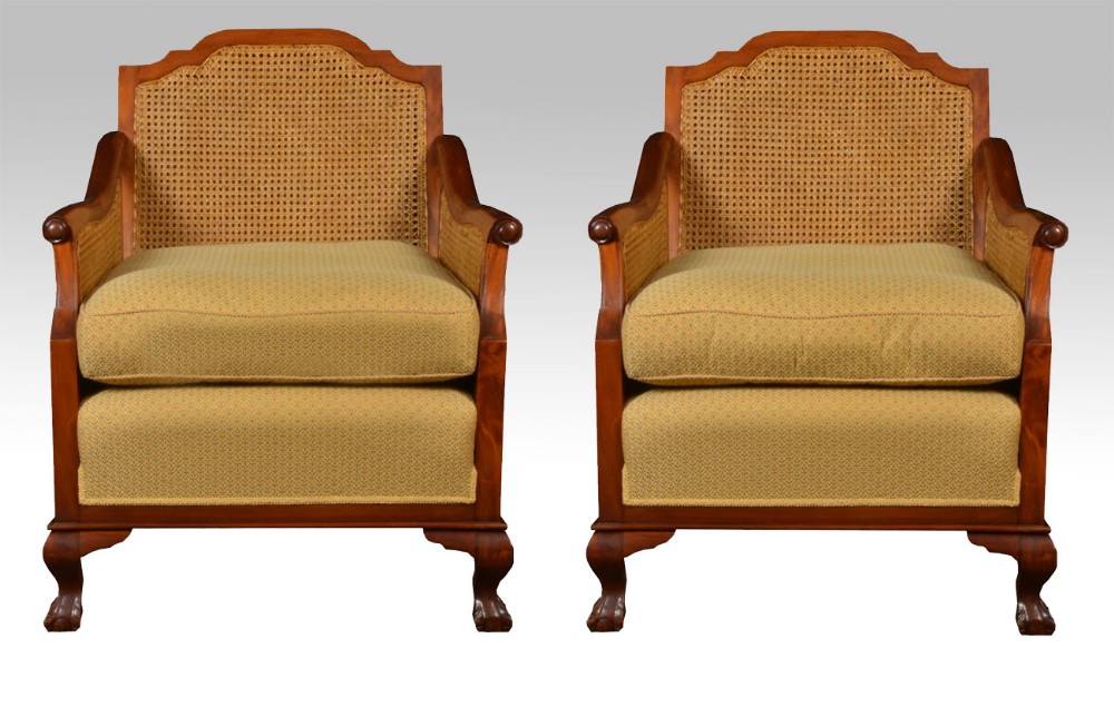 Pair of Mahogany framed burgere arm chairs 