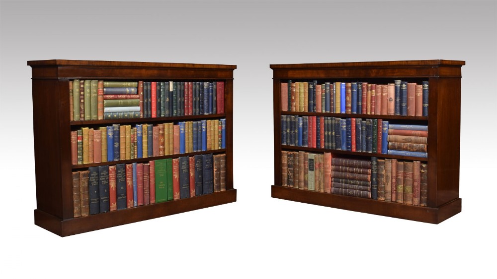 Pair of walnut open bookcases 