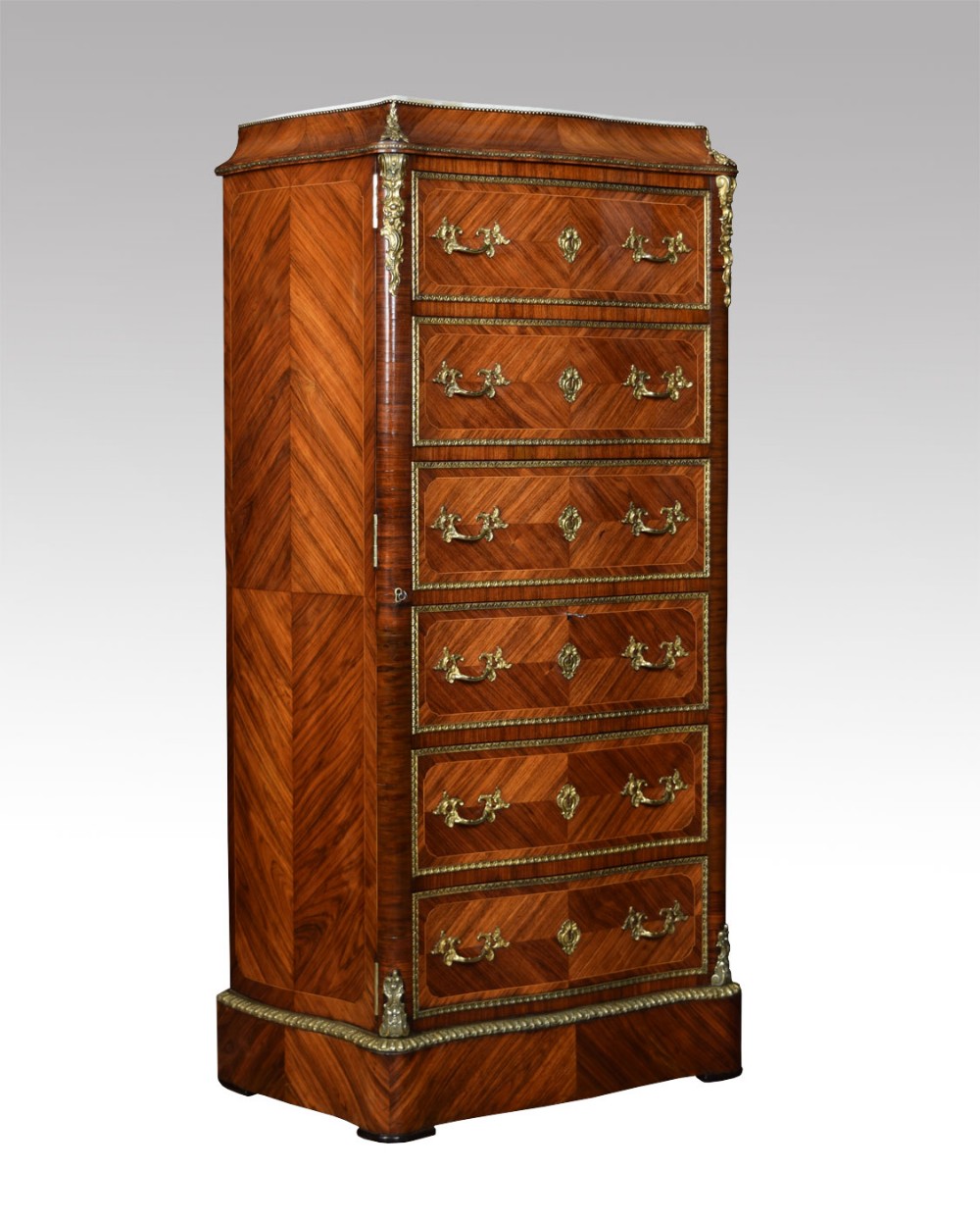 19th Century Kingwood serpentine fronted chest of draws in the Louis XVI taste