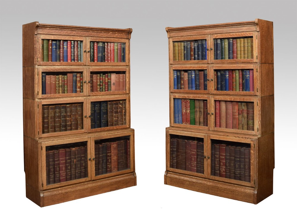 Pair of oak four sectional bookcase