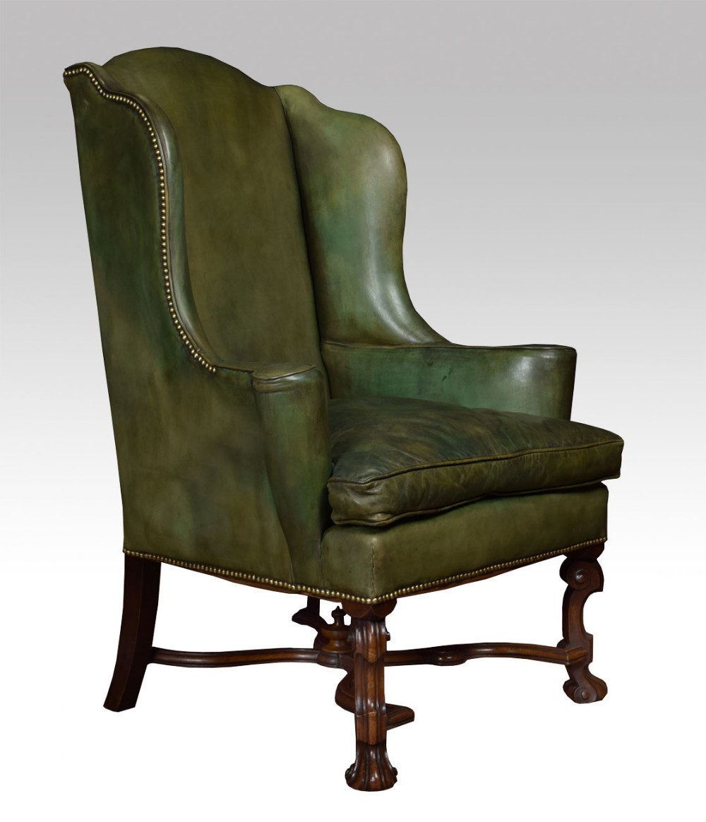 William and Mary style leather upholstered wingback armchair 