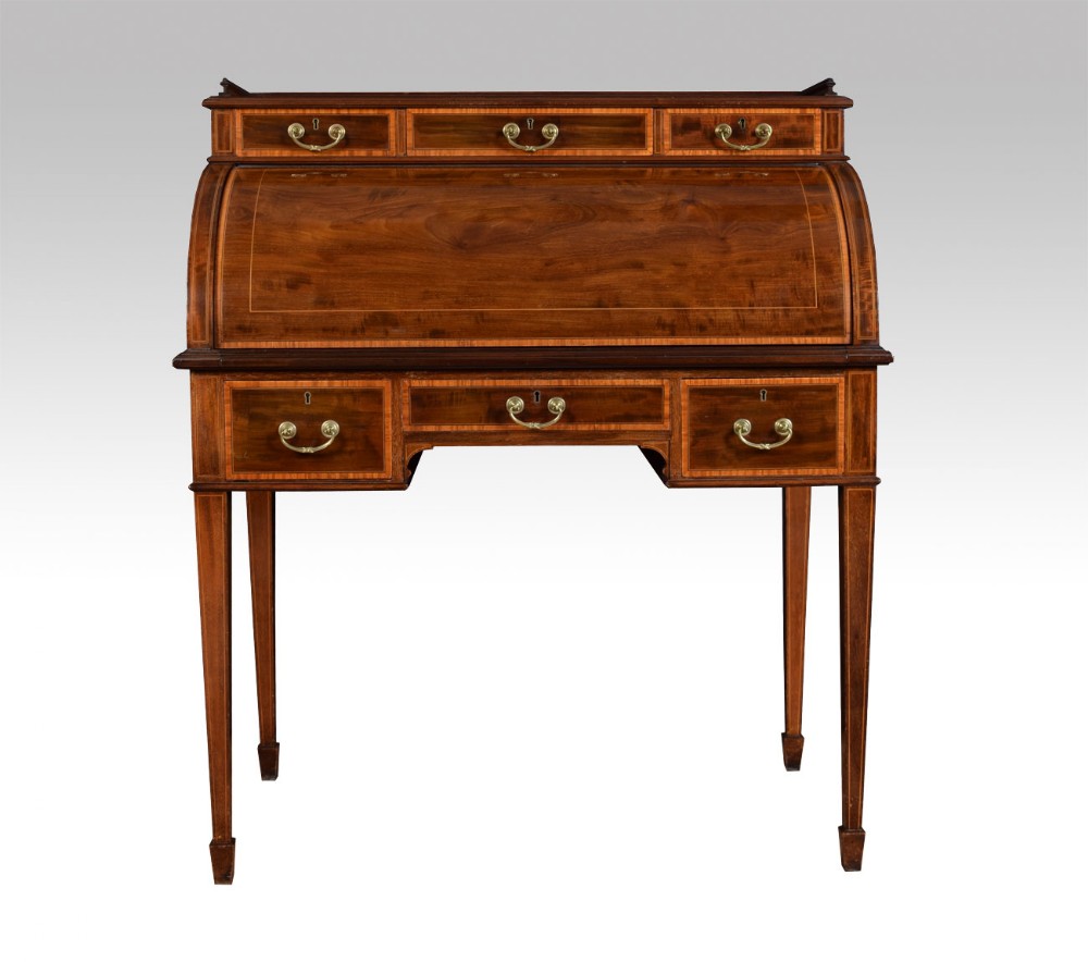 Edwardian mahogany and satinwood cross banded cylinder top desk by Maple & Co