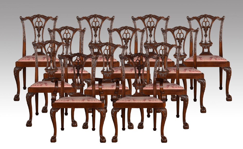 Set of twelve Chippendale style dining chairs 