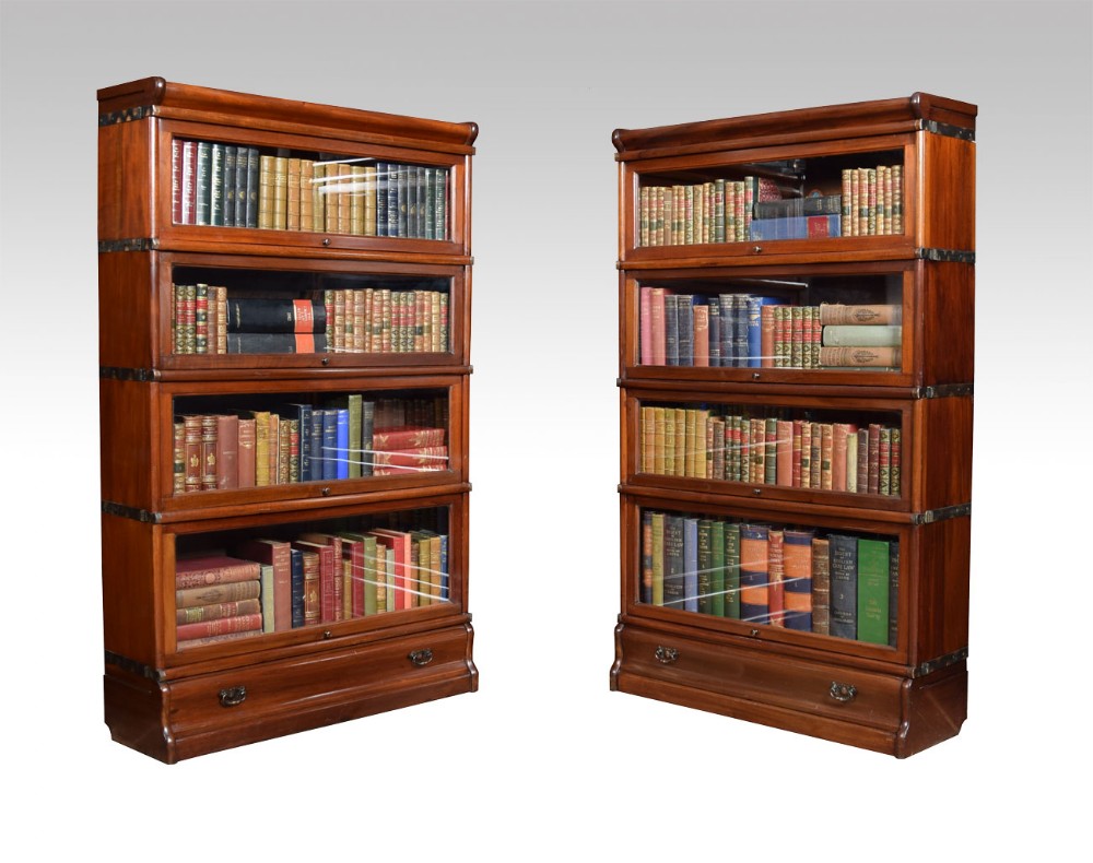 Pair Mahogany globe Wernicke four section bookcases 