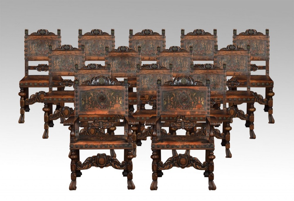 Set of fourteen Baroque style walnut dining chairs