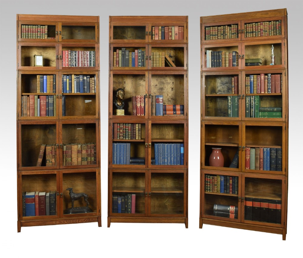 Three large Oak sectional bookcase by E.S.A London