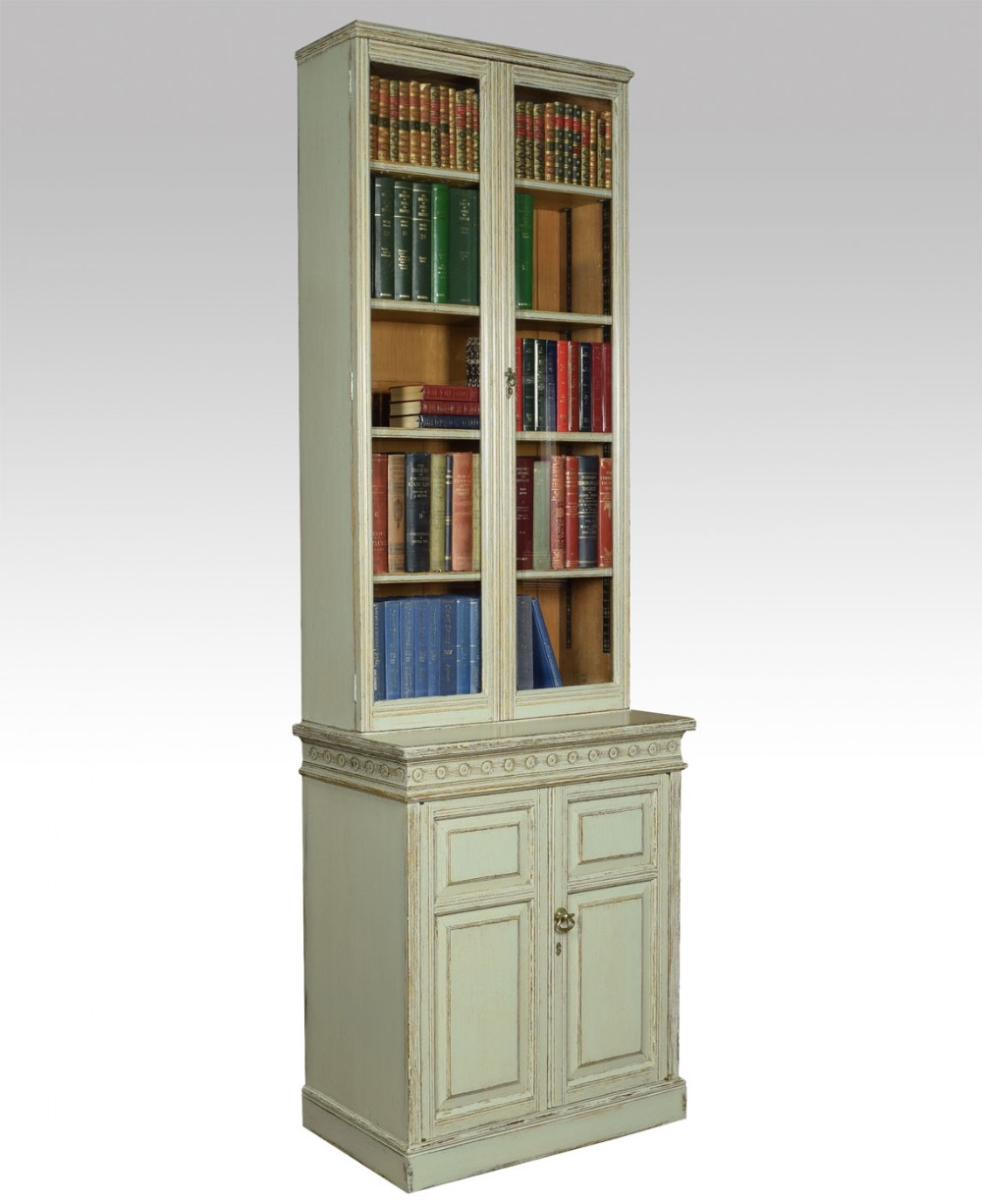 Tall painted oak bookcase by Howard and Sons