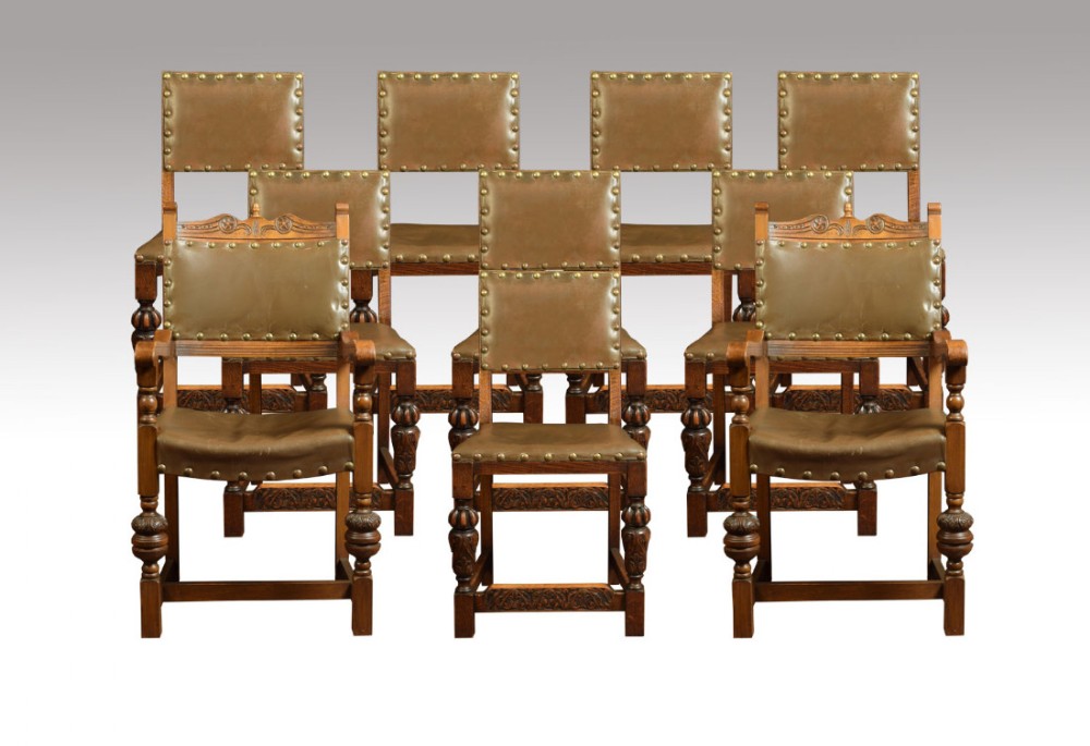 Set of ten carved dining chairs