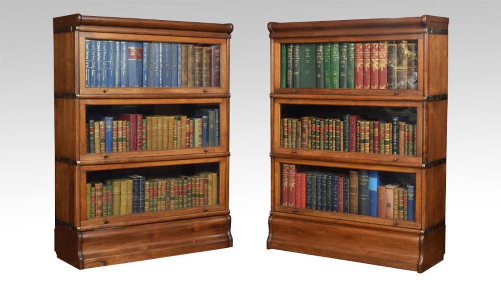 Pair Mahogany globe Wernicke three section bookcases