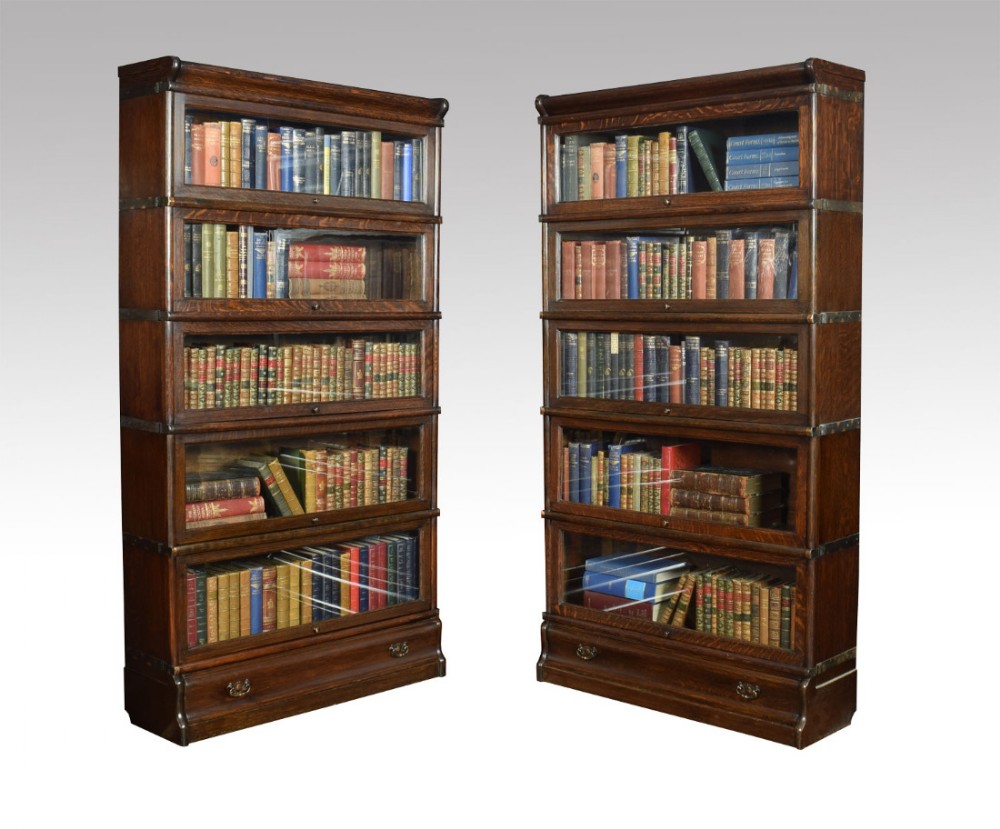 pair of oak globe Wernicke five section bookcases 