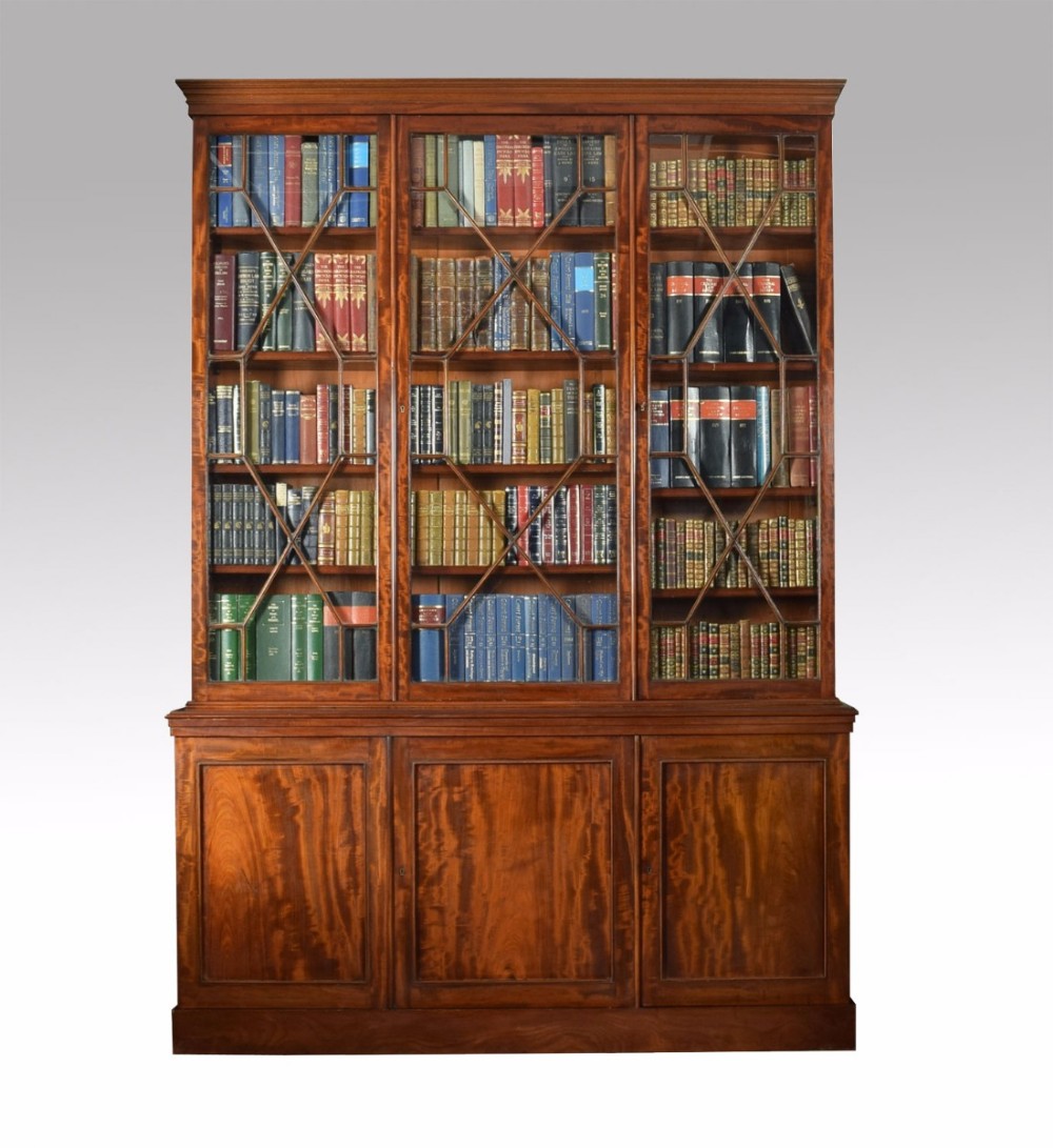 Mahogany astragal glazed three door bookcase