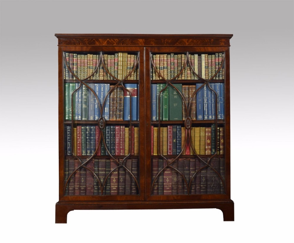 Mahogany two door glazed display bookcase