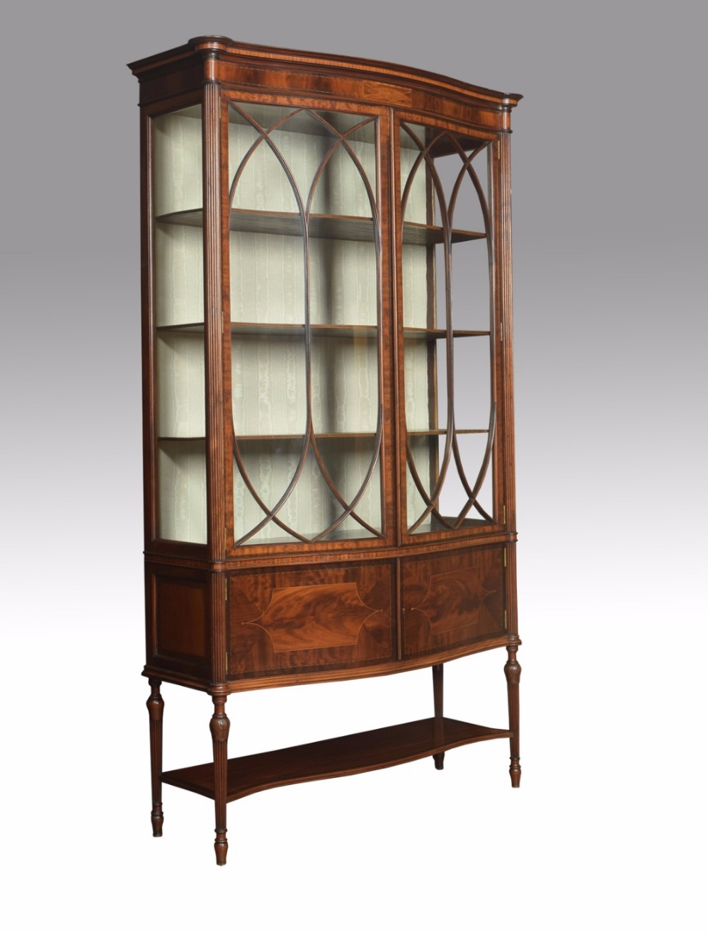 Edwardian mahogany bow front display cabinet