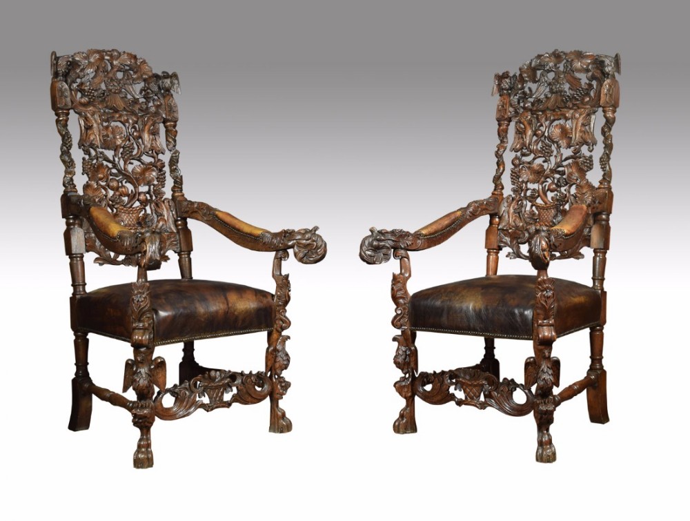 Monumental pair of Victorian carved oak throne armchairs