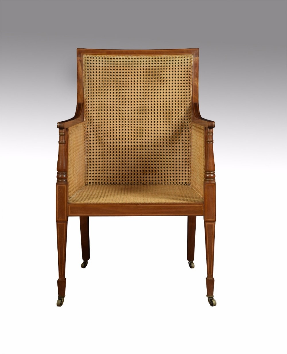 Edwardian mahogany bergere armchair