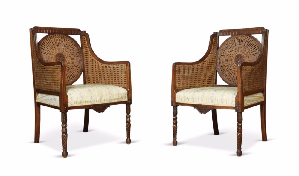 Early 20th Century pair of double caned bergere armchairs