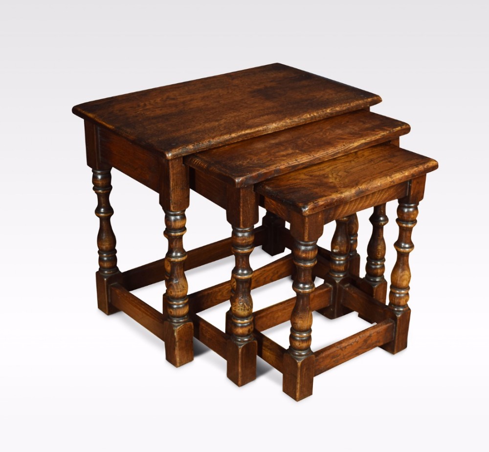 Nest of three solid oak tables