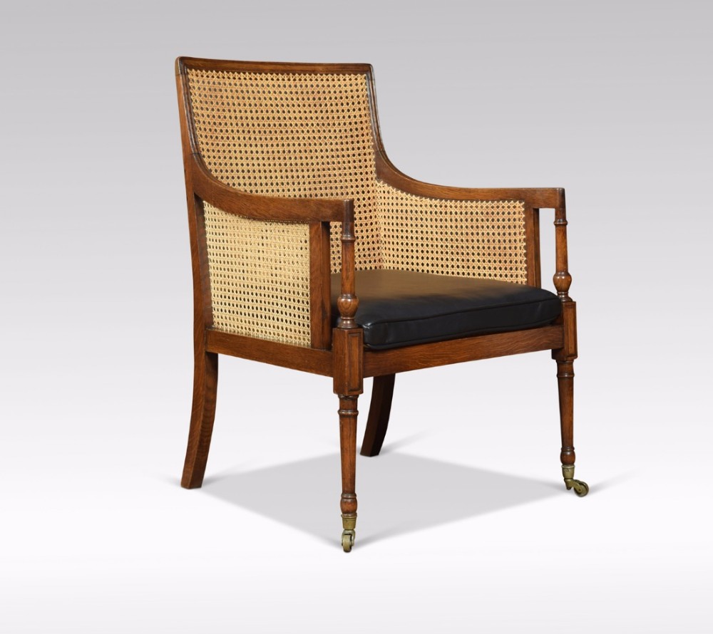 Regency oak bergere armchair
