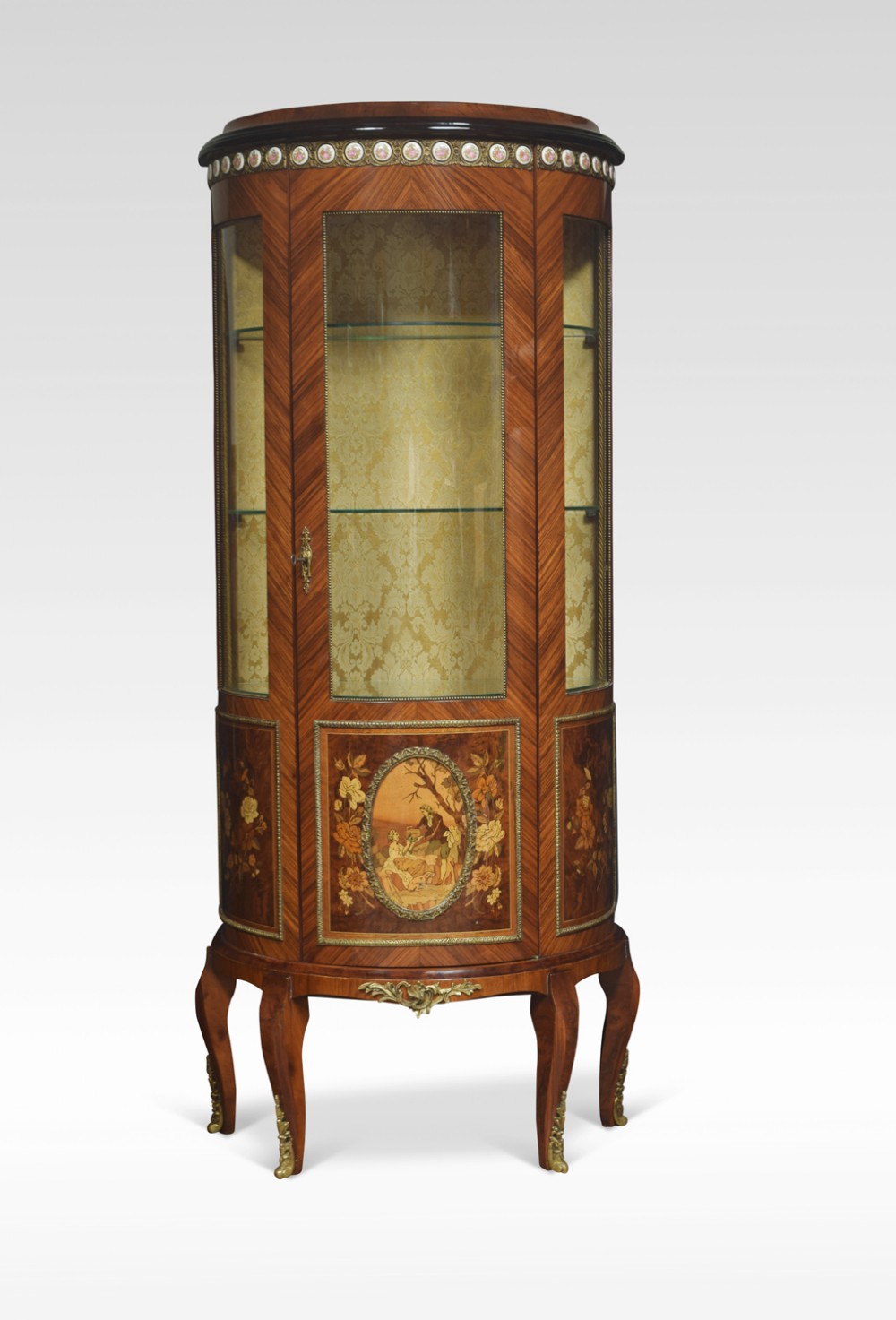 Kingwood bow fronted display cabinet attributed to Epstein