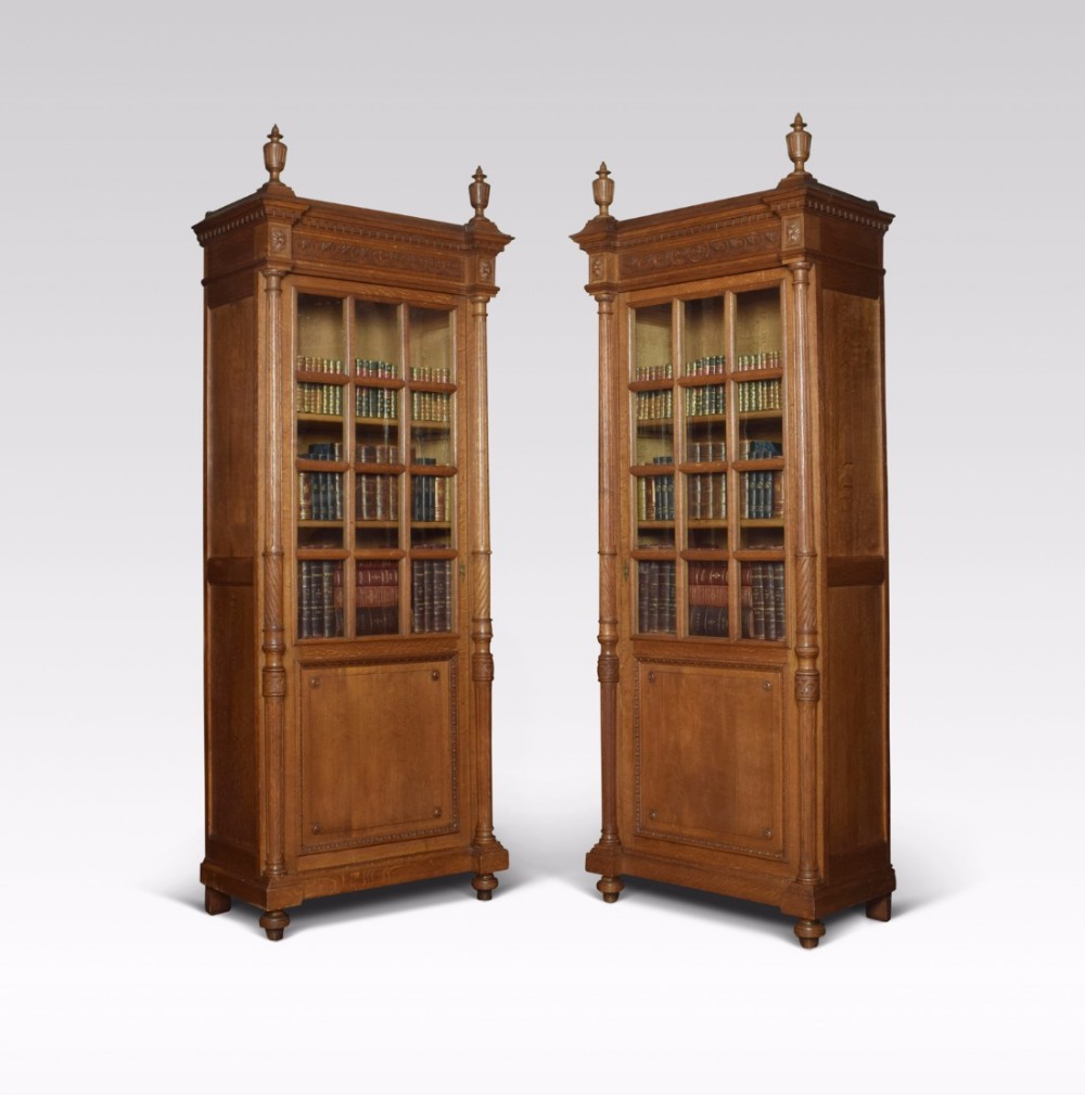 Pair of tall oak bookcases