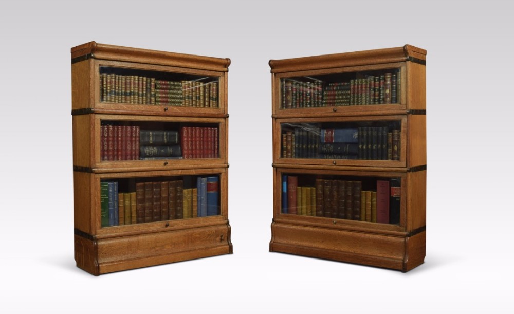 Pair globe Wernicke three section bookcases