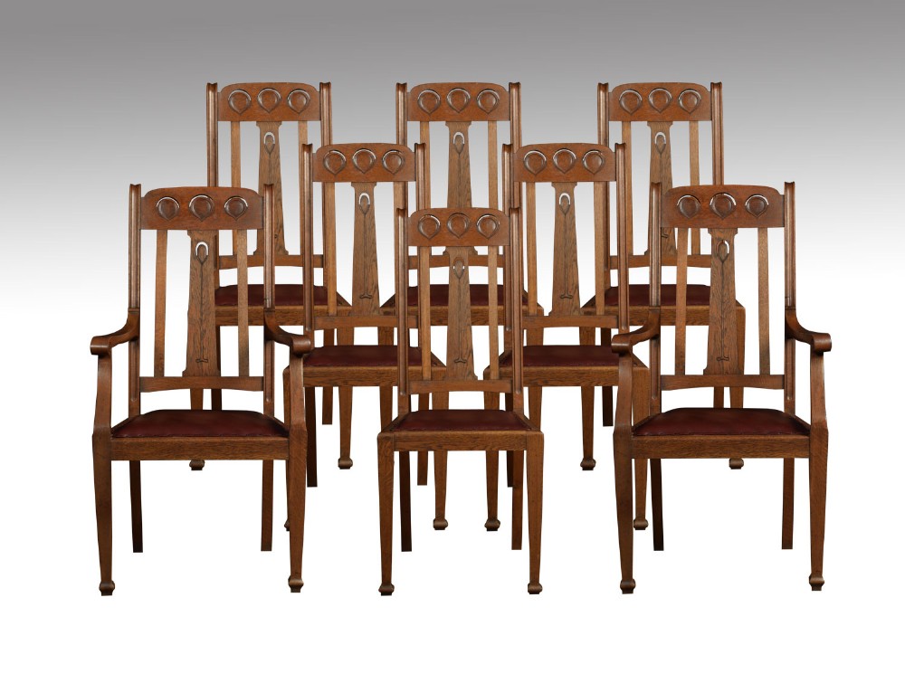Set of eight oak Arts and Crafts dining chairs
