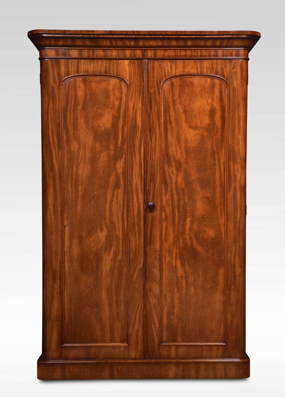 Mahogany two door compactum wardrobe