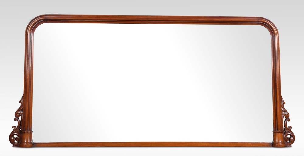 Very large mahogany carved over-mantle wall mirror