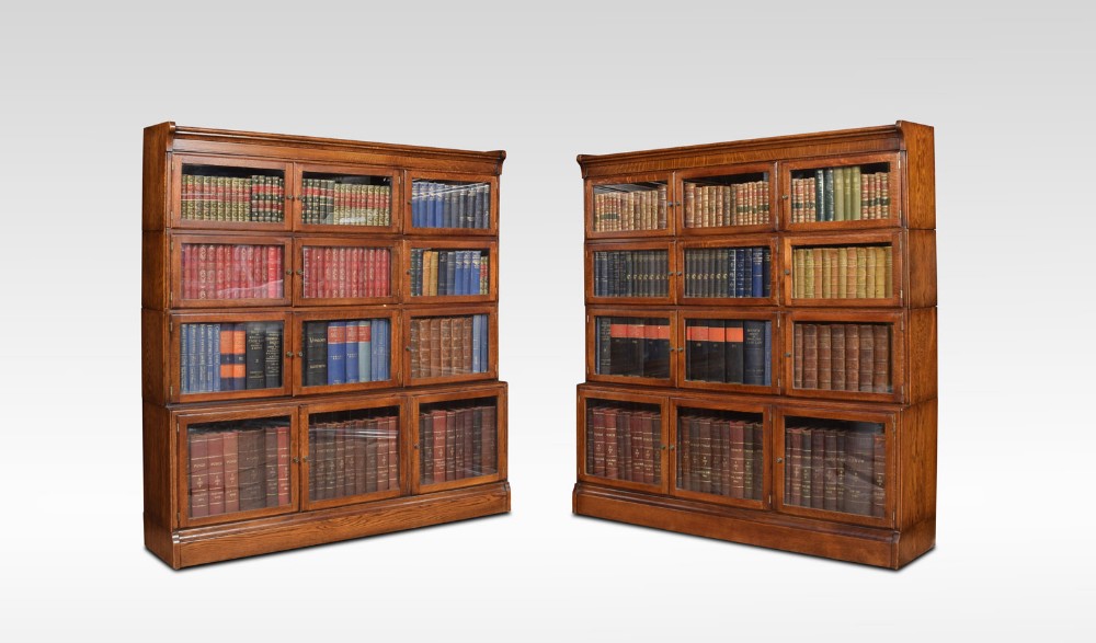 Pair of large oak sectional bookcases