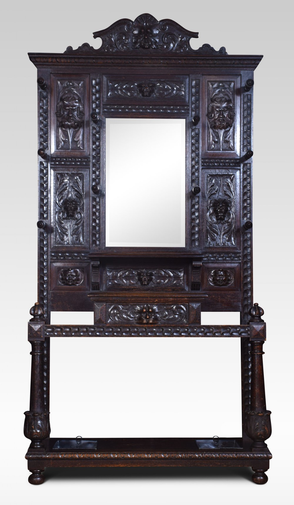 Carved oak hall stand