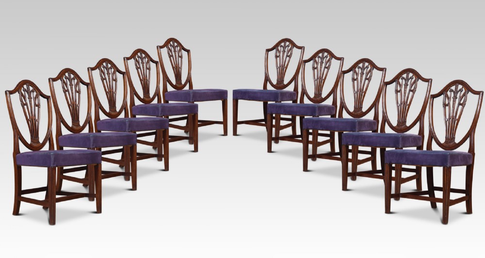 Set of ten mahogany shield back dining chairs
