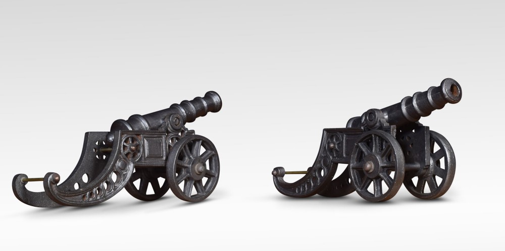 Pair of cast Iron models of cannons