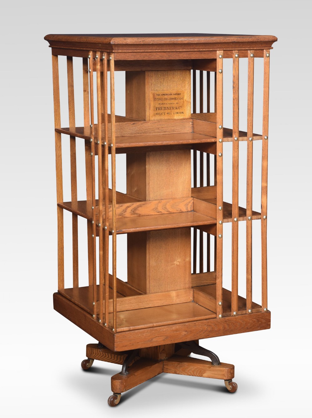 Oak three tier revolving bookcase