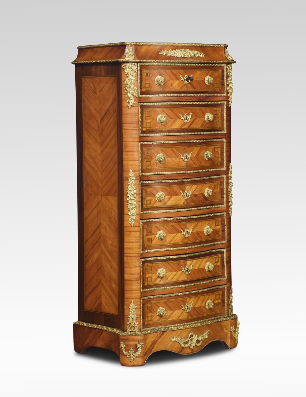 Serpentine fronted Kingwood tall chest of drawers