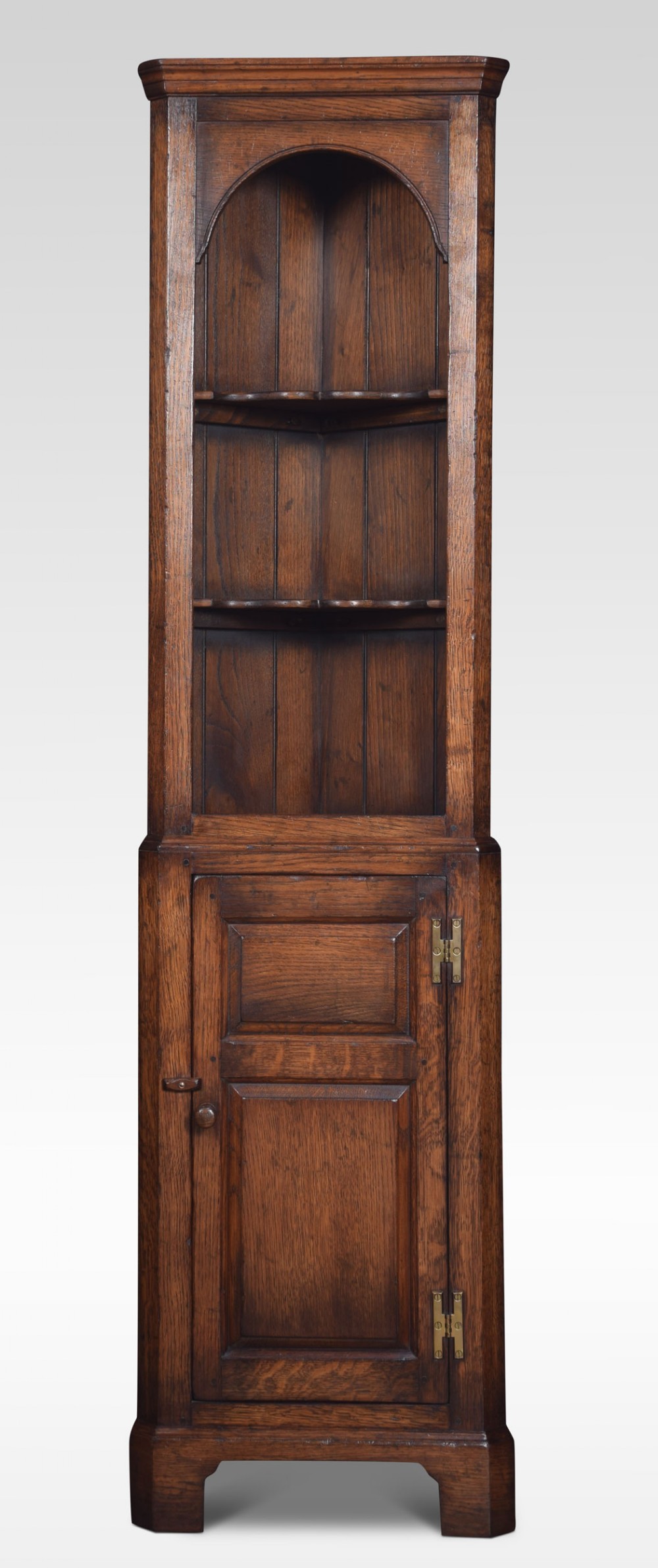 Narrow oak floor standing corner cupboard