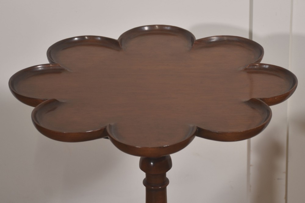 A pair of polished dark mahogany tripod side tables featuring scalloped pie-crust tops, turned central pedestals, and carved cabriole legs. View III