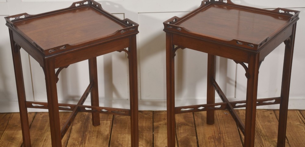 A pair of dark mahogany Edwardian side tables with square tops, pierced fretwork galleries, and cross stretchers. View III