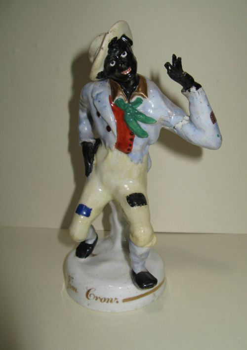 fig 1. VICTORIAN STAFFORDSHIRE FIGURE OF JIM CROW c1850