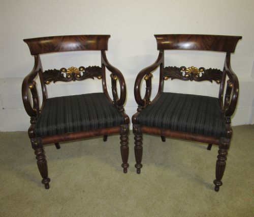 Pair of 19th Century Mahogany and Parcel Gilt Open Arm Chairs
