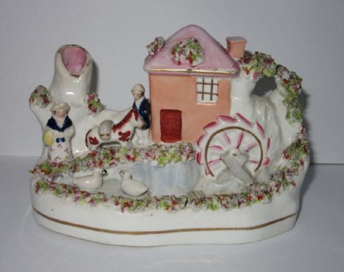 Unusual Staffordshire Figure of Miller & Wife C1860