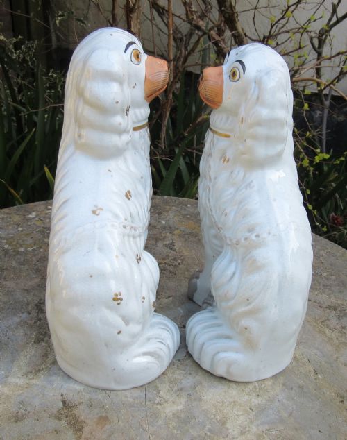 fig 1. PAIR OF VICTORIAN WHITE STAFFORDSHIRE DOGS c1860